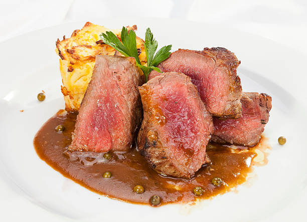 Grilled Sirloin with pepper sauce stock photo