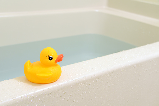 Bathroom images with yellow duck toy