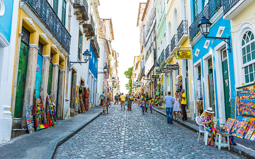 Bahia, Brazil - November 16, 2014: People walk in Pelourinho area, famous Historic Centre of Salvador, Bahia in Brazil.