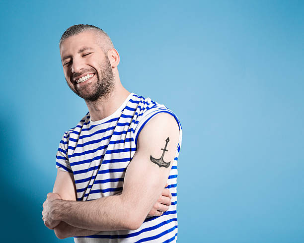 Happy Bearded Sailor Man Wearing Striped Tshirt Stock Photo - Download Image Now - Tattoo, Bicep, Men - iStock Happy Bearded Sailor Man Wearing Striped Tshirt Stock Photo - Download Image Now - Tattoo, Bicep, Men - iStock