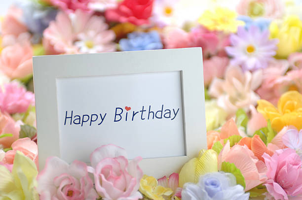 Message board with many flowers, happy birthday Message board with many flowers, happy birthday 文章 stock pictures, royalty-free photos & images