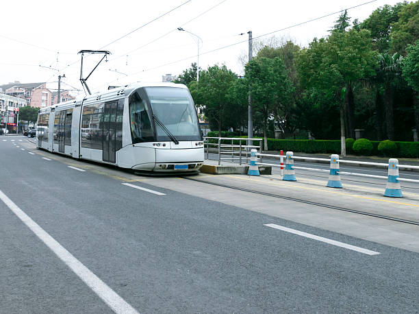 istock Tram running on road at Zhangjiang development district, Pudong, 467928488