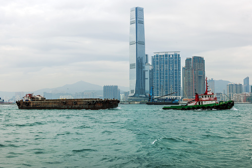 Ships and International Commerce Centre Tower ,cargo ships, ship repair,,Kowloon Peninsula, China,Nikon D3x