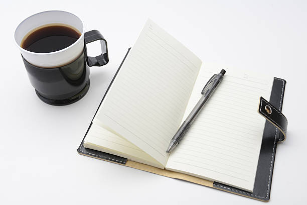 istock Personal organizer and cup of instant coffee for taking out 467933744