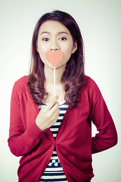 istock attractive asian smiling woman 467933980