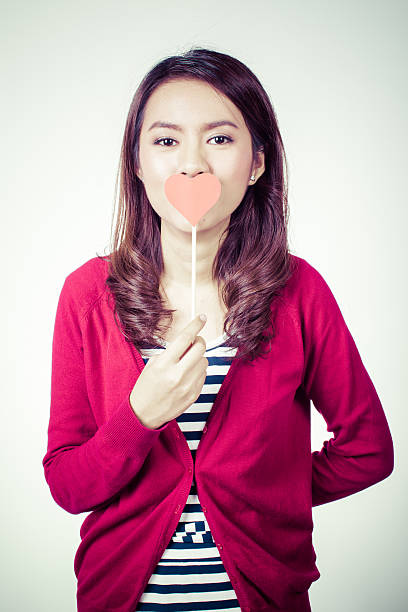 istock attractive asian smiling woman 467934010