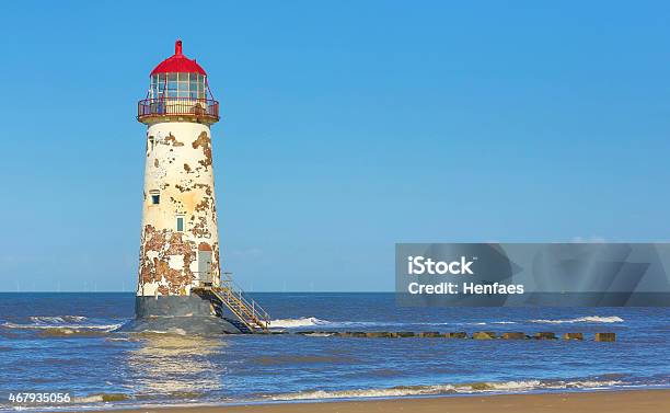 Derelict Lighthouse On The Edge Of The Coast Stock Photo - Download Image Now - 2015, Accessibility, Barren