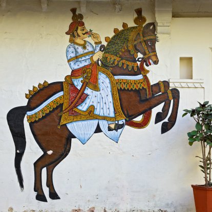 Udaipur is famous for its paintings on external walls of buildings. Here's a fresco of horse & rider on the walls of City Palace. Author is unknown as for all of these pictures.