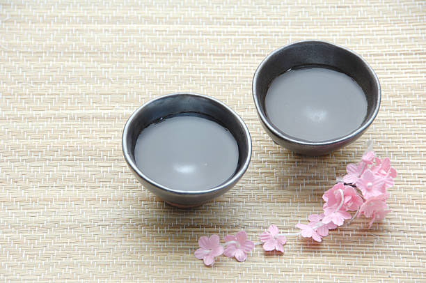 istock Sake, Japanese liquor with cherry blossoms 467938364