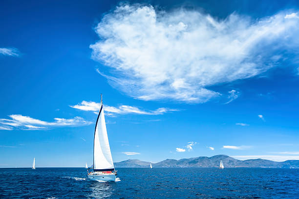 Boat in sailing regata on the Sea.