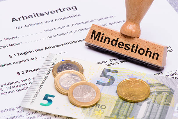minimum wage in Germany minimum wage in Germany with 8,50 Euros and self made employment contract minimum wage stock pictures, royalty-free photos & images