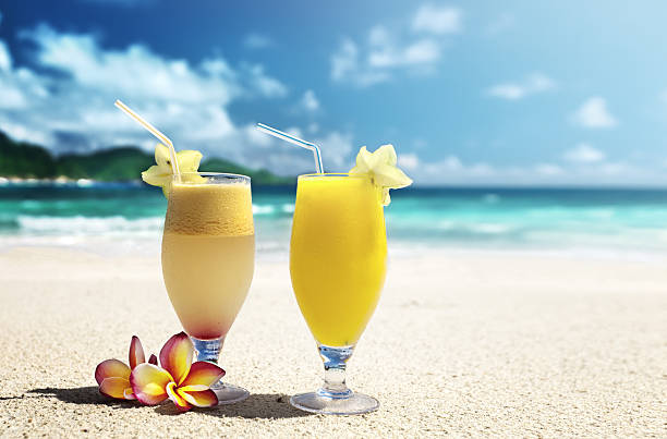 fresh fruit juices on a tropical beach