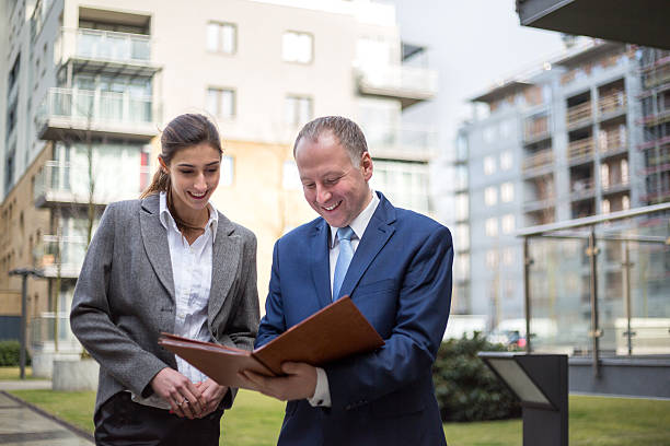 istock Two business people discussing outside the office 467952998