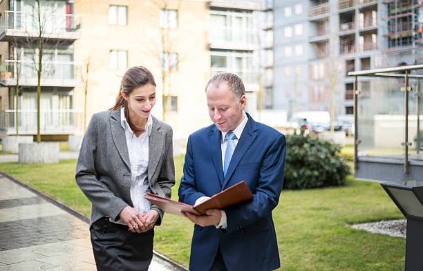 istock Two business people discussing outside the office 467953014