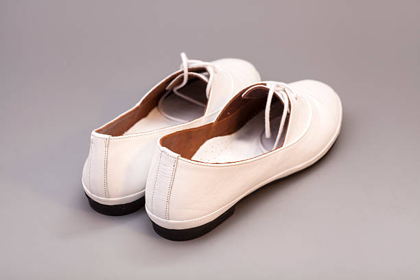 istock White Shoes isolated on gray background 467953316