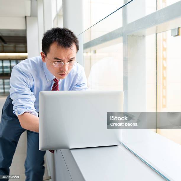 Businessman Using Laptop Stock Photo - Download Image Now - 2015, 30-39 Years, Adult