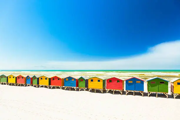 Row of colorful beach houses in Muizenberg near Cape Town, South Africa. 