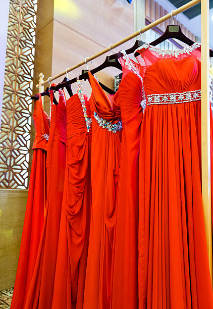 Wedding dress Group of wedding dress on the rack. red evening gown mannequin indoors stock pictures, royalty-free photos & images