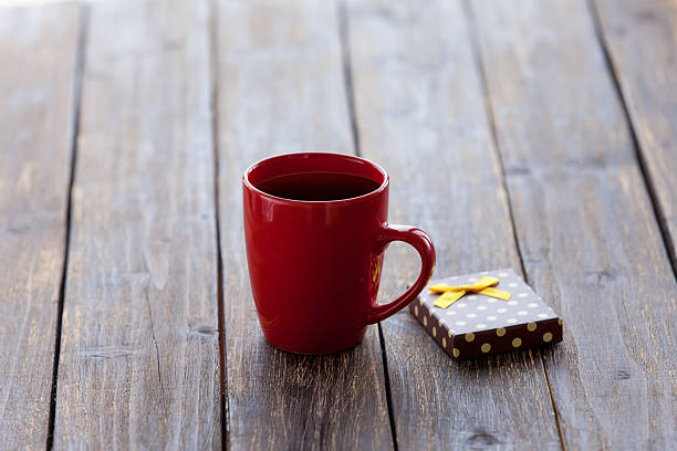 istock Cup of coffee and gift box 467959992