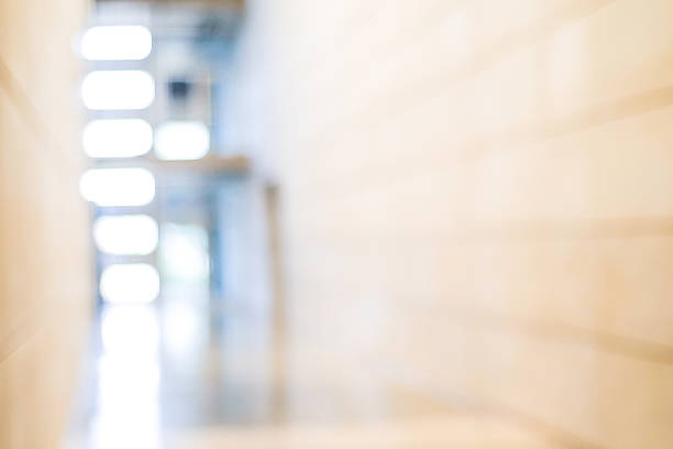 istock Blur inside office building with bokeh light background, busines 467960026