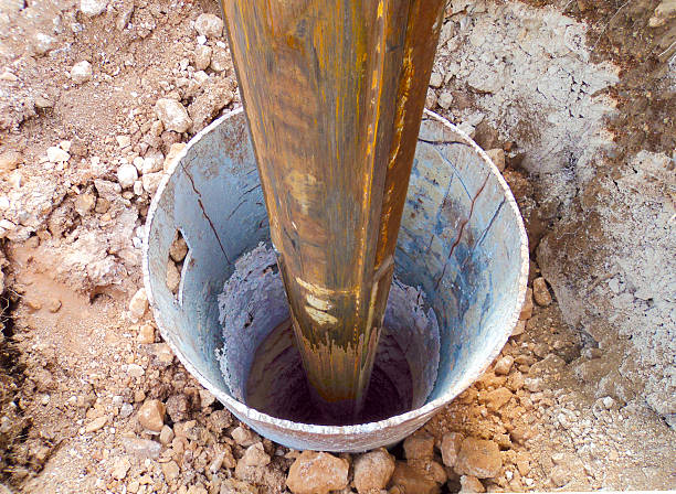 drilling pile foundation drilling pile foundation with protective plate wells stock pictures, royalty-free photos & images
