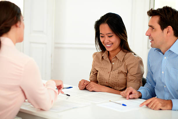 istock Young couple working with financial advisor 467967263