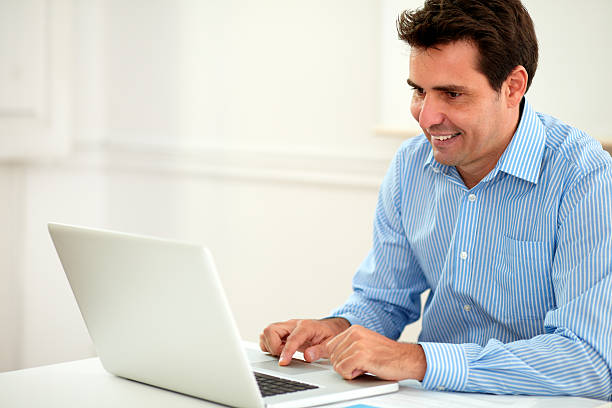 istock Alone adult businessman working on his laptop 467967769