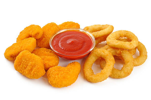 istock Nuggets, onion rings and ketchup. 467969620