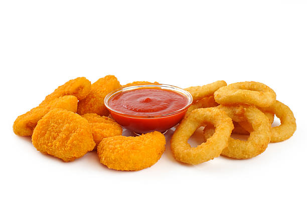 istock Nuggets, onion rings and ketchup. 467969622