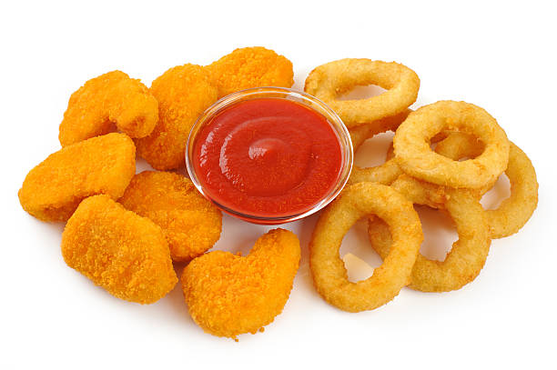 istock Nuggets, onion rings and ketchup. 467969628