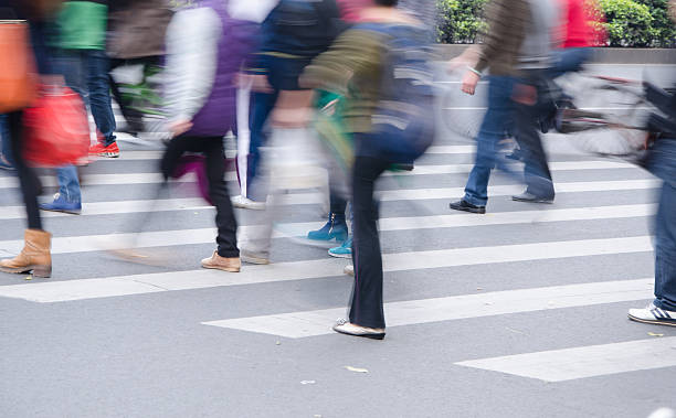 istock People walking on big city street 467969936