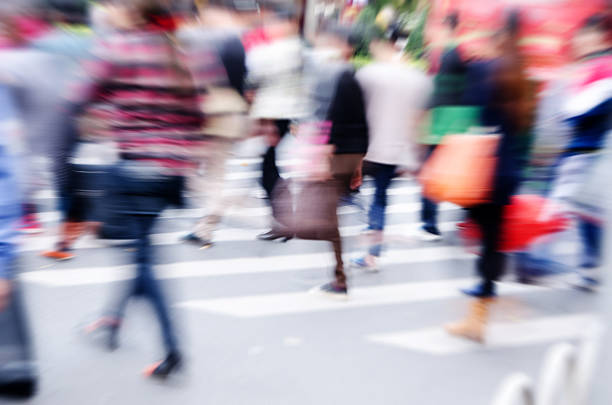 istock People walking on big city street 467970548