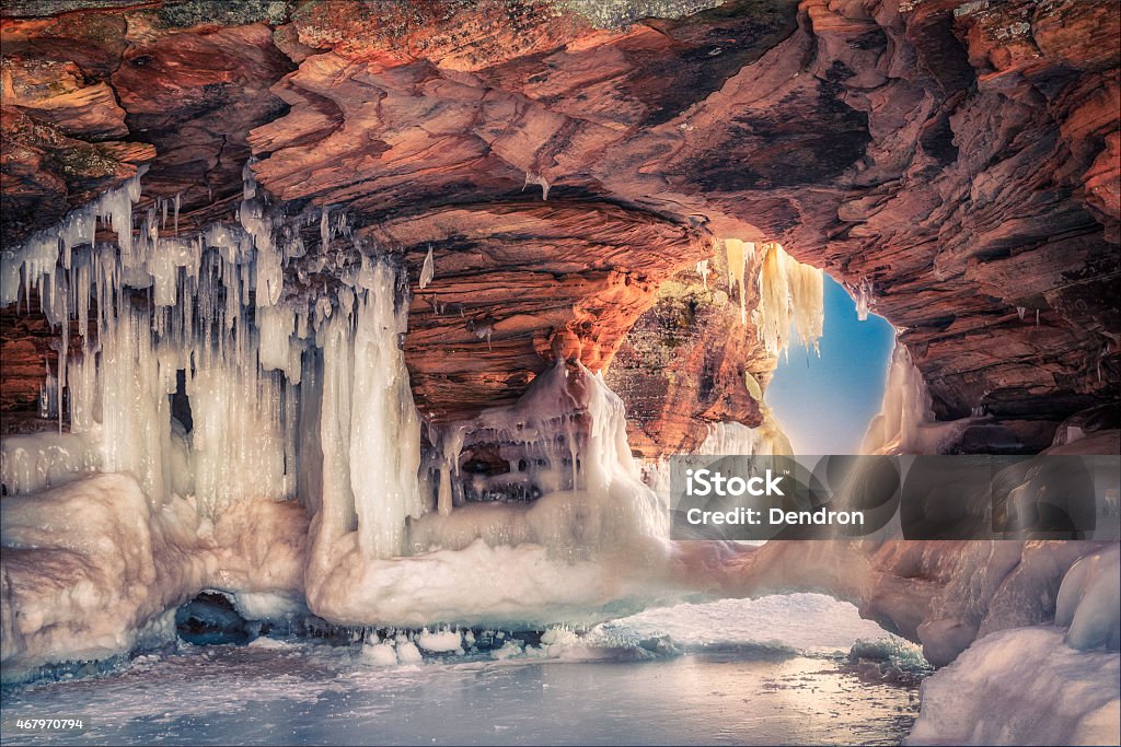 Ice Arch A beautiful natural arch on Lake Superior covered in ice Ice Cave Stock Photo