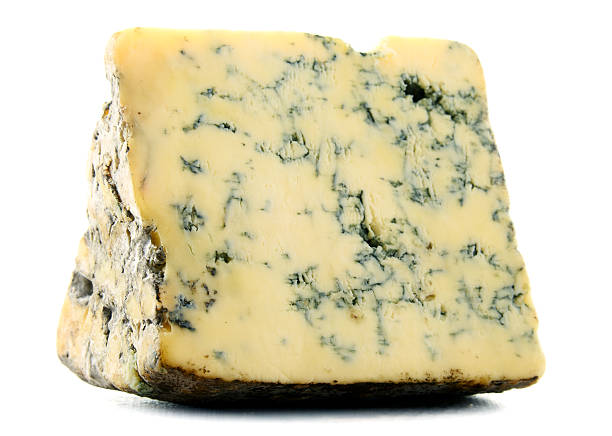 istock Piece of blue cheese isolated on white 467971098