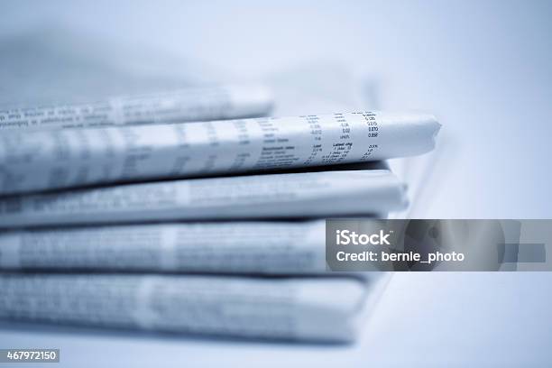 Newspaper Isolated On White Background Stock Photo - Download Image Now - Blue, Newspaper, Stack