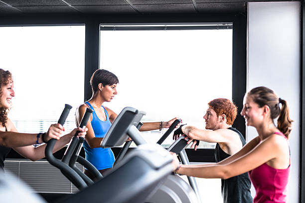 istock friends talking on the gym treadmill 467973832