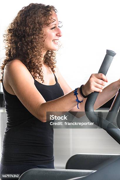 Woman Walking On The Gym Treadmill Stock Photo - Download Image Now - 20-29 Years, 2015, Active Lifestyle