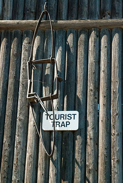 Whimsical Sign of Tourist Trap Kearney Nebraska Whimsical Sign of Tourist Trap on the log walls of old Fort Kearney Nebraska kearney nebraska stock pictures, royalty-free photos & images