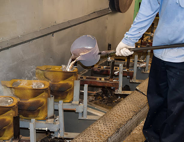 istock operator pouring aluminum automotive parts 467981748