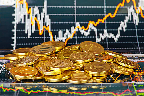 istock Golden coins and financial chart as  background 467982281