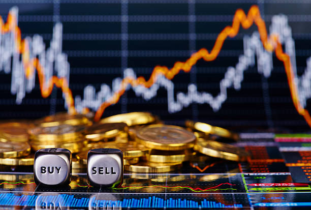 istock Dices cubes, golden coins and financial chart 467982419