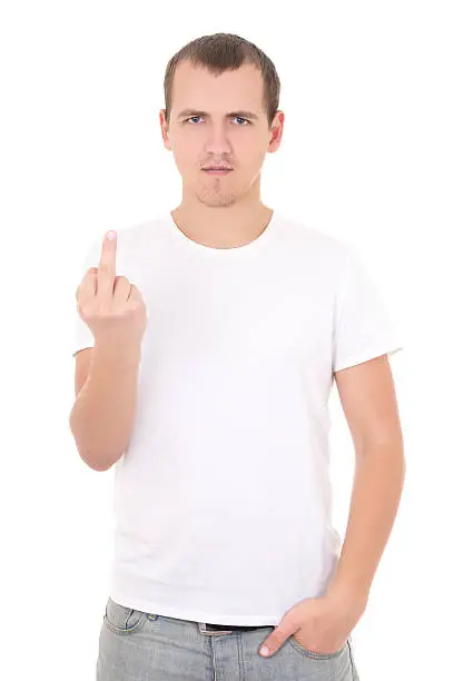 Photo of young man showing middle finger isolated on white