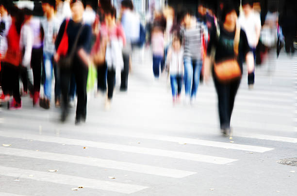 istock People walking on big city street 467989502