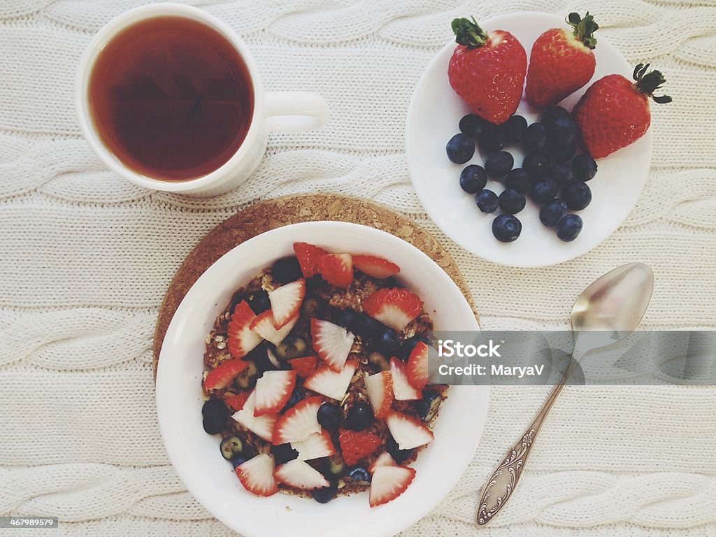 Breakfast Fresh fruits and cereal. Almond Stock Photo