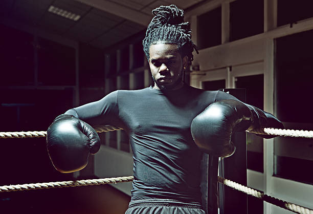 istock black boxer relaxing in the boxing ring corner 467993396