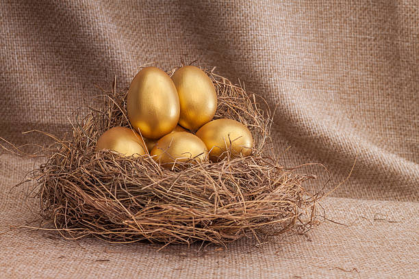istock Heap of golden easter egg in nest 467993612