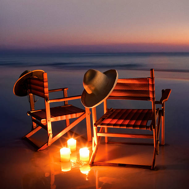 istock Wooden beach chairs on beach at sunset or sunrise, 467994030