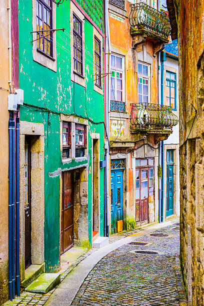 Alleyway in Porto, Portugal Quaint alleyway scene in Porto, Portugal. vila nova de gaia stock pictures, royalty-free photos & images