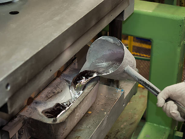 istock operator pouring aluminum automotive parts 467997116