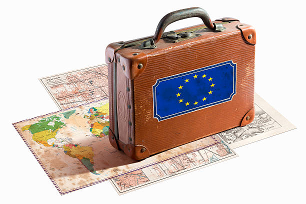 istock Antique leather suitcase with Europe flag on maps 467997575